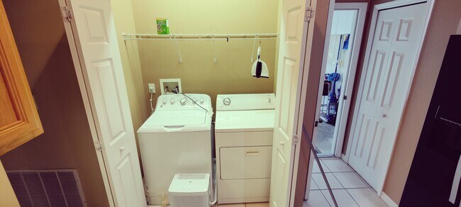 Laundry closet in kitchen - 3602 Westover Cir