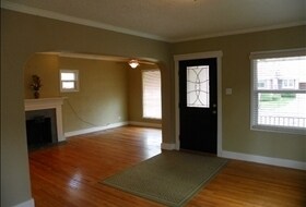 Building Photo - 3 BD. 1 BA. Granite Counters. Wood Floors