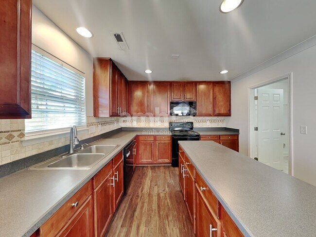 Building Photo - 6747 Thistle Down Dr