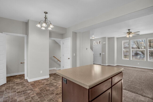 Building Photo - Spacious 4BR End-Unit Townhome | Low-Maintenance HOA Living