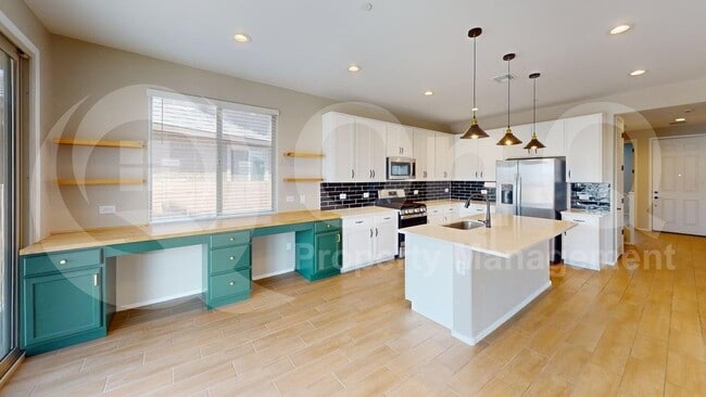 Building Photo - 10587 W Chadwick Dr