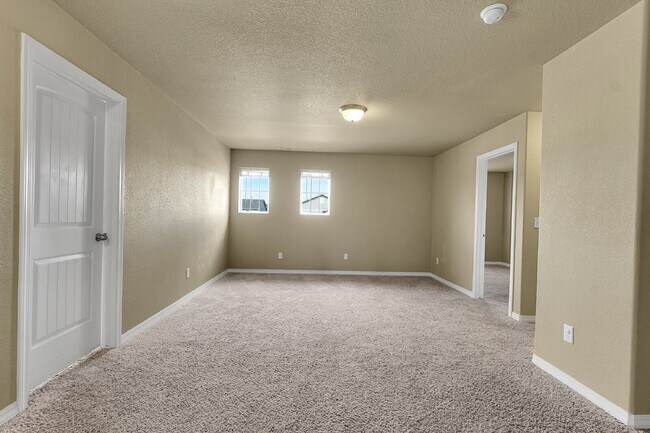 Building Photo - $2,490.95 - 4 Bed, 2.5 Bath Home in CO Springs with Fenced in Yard and 3 Car Garage!