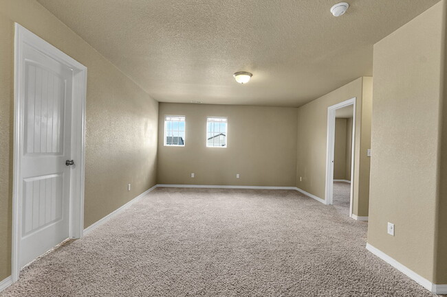 Building Photo - $2,540.95 - 4 Bed, 2.5 Bath Home in CO Springs with Fenced in Yard and 3 Car Garage!