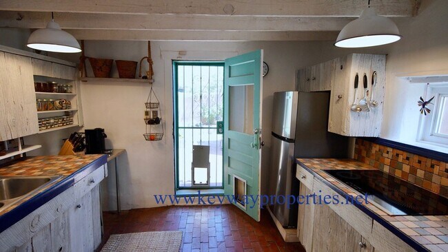 Building Photo - Classic New Mexican Adobe Retreat in the Heart of Los Ranchos