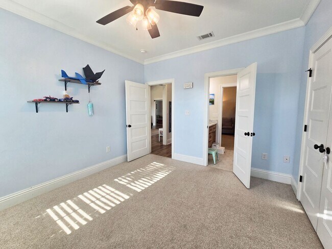 Building Photo - Spacious 4BR/3BA Home with Open Floor Plan, Screened Porch & Fenced Backyard