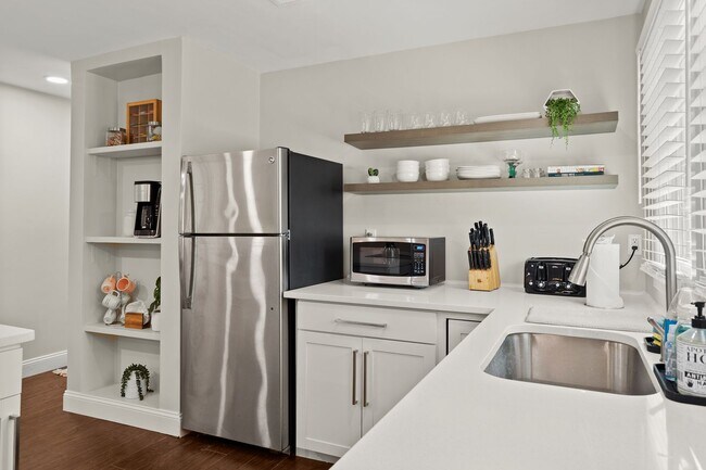 Building Photo - Classic Brick Ranch with Modern Updates and Expansive Backyard