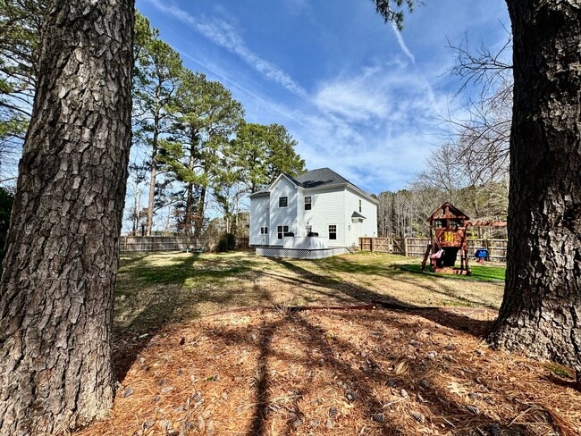 Building Photo - Farmhouse-style Home - Ready NOW in Pungo! A First Time Rental with a HUGE Fenced Yard, Attached ...