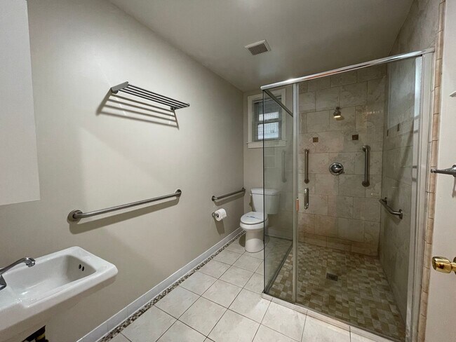 Building Photo - 2 Car Garage Included! Downstairs 2 Bed 2 Full Bath AND Washer and Dryer!