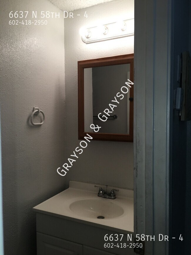 Building Photo - 6637 N 58th Dr