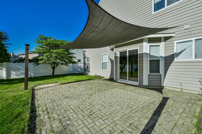 Building Photo - 8189 Admirals Landing Pl