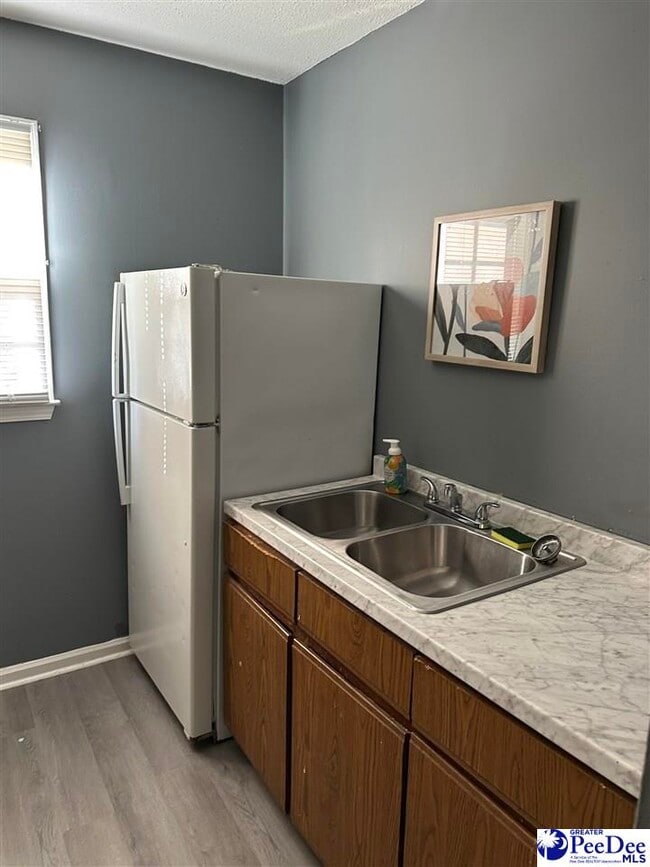 Building Photo - 1017 E National Cemetery Rd