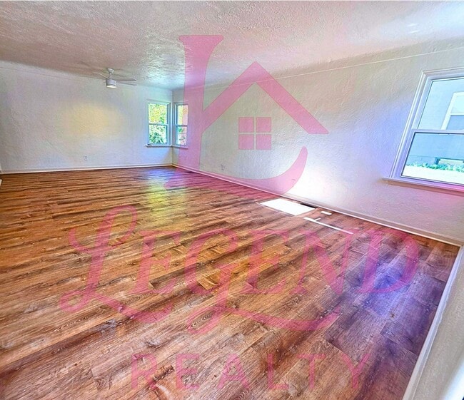 Building Photo - Charming 3-Bedroom with Huge Yard & Covered Patio