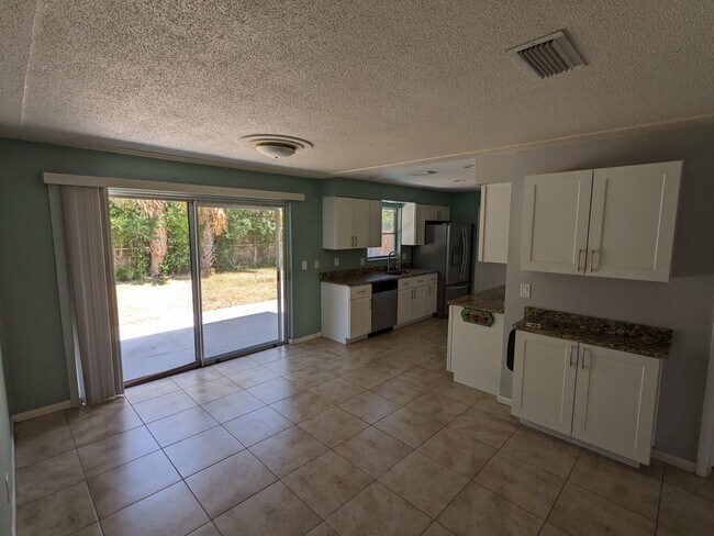 Dining room into kitchen - 430 Patrick Ave