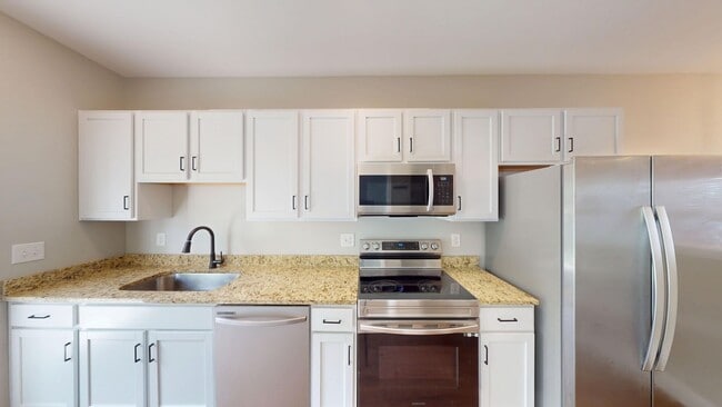 Primary Photo - Two Bedroom Townhomes With Flex Room at Th...