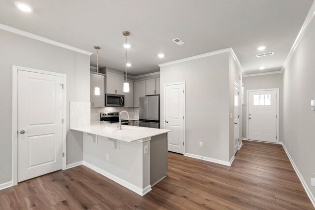 Building Photo - Modern 3-Bedroom Townhome with Luxury Fini...