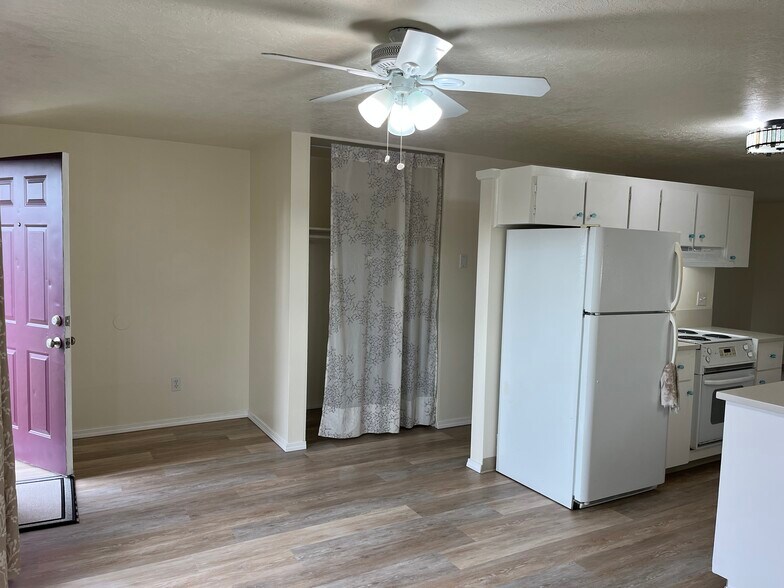 Kitchen from dining room, coat closet - 65 NE 19th St