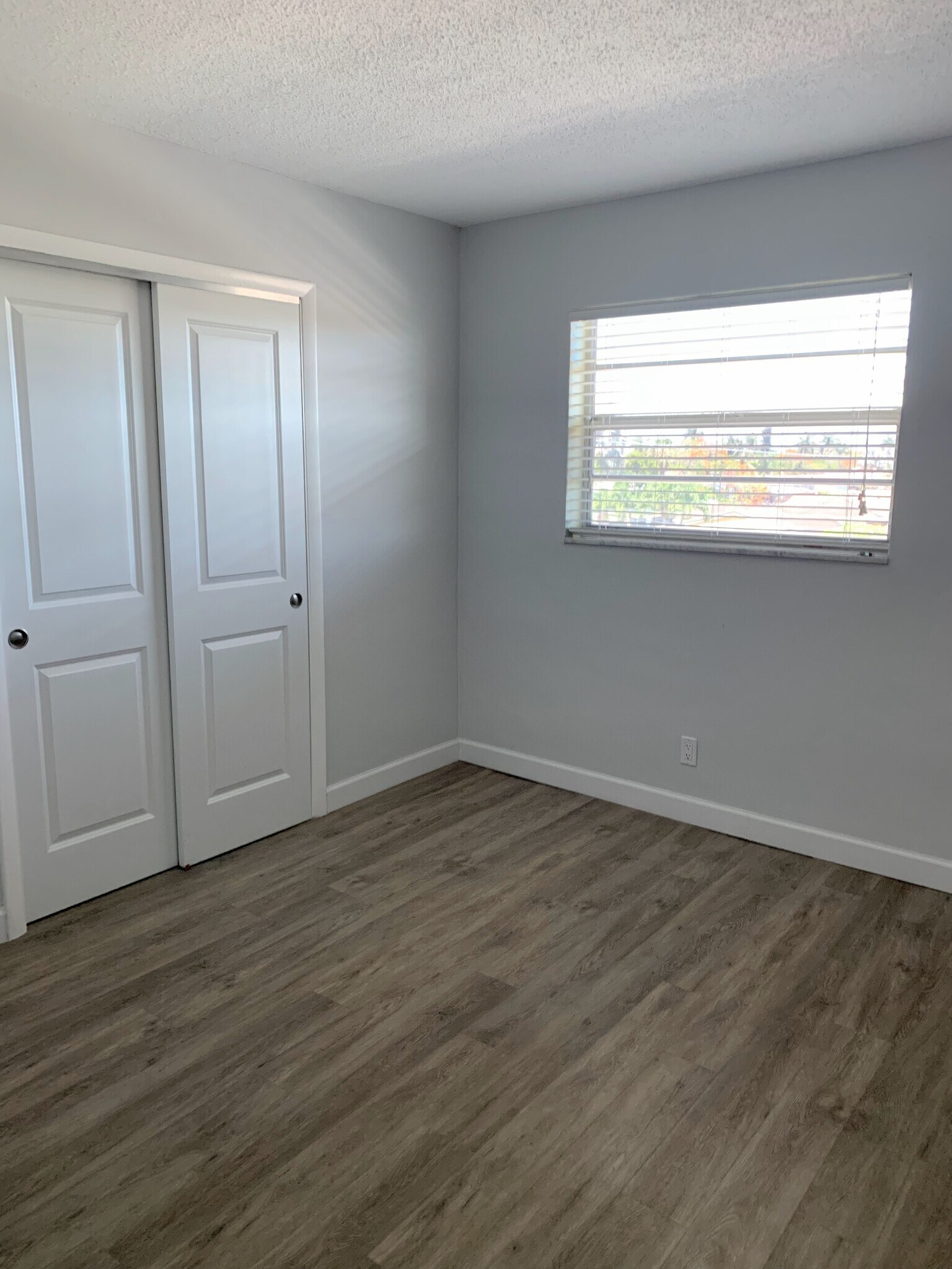 Large Guest Bedroom Windoweled Doors - 1400 NE 57th St