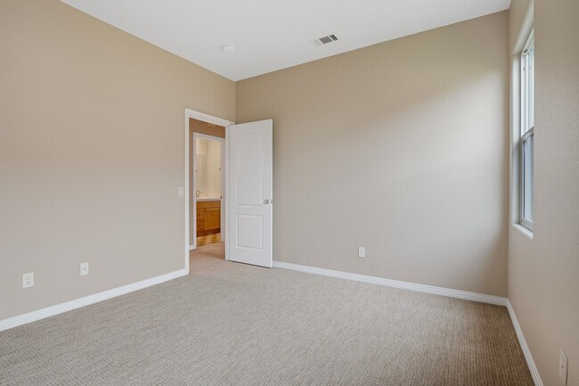 Building Photo - Gated corner lot home walking distance to the beach