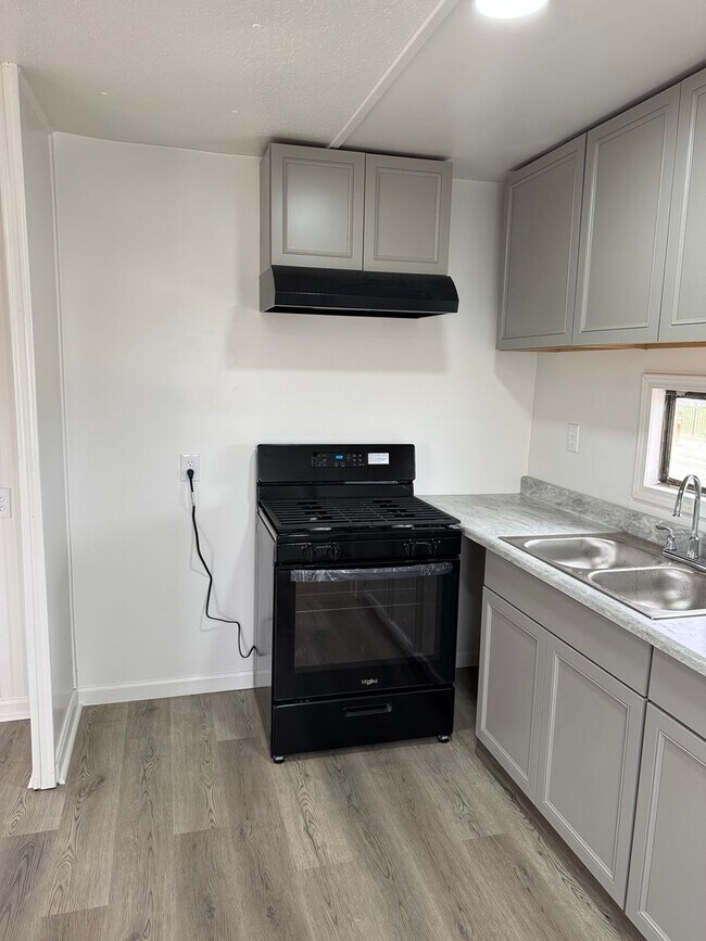 Building Photo - **Now Available!! Stevinson Mobile Home