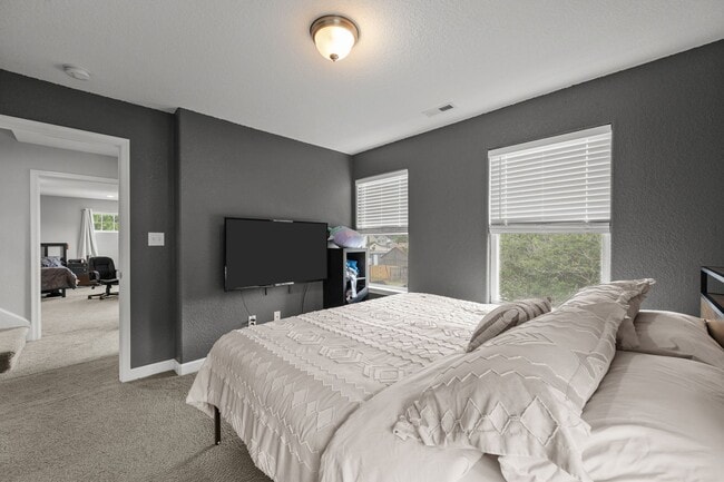Building Photo - Spacious 6-Bedroom Home with Private Backy...