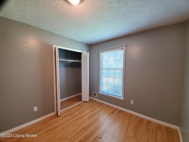 Building Photo - 9211 N Pirogue Ct