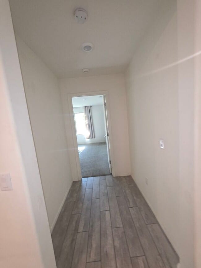 Building Photo - COMING SOON! New 3BR 2 BA Home w/ 2-Car Garage • Stainless Kitchen • Timer-Irrigated Yard in East...