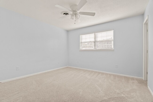 Building Photo - Charming 3BR with Fenced Yard