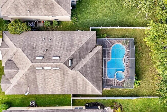Building Photo - "Stunning 3BR Orlando Home with Private Screened Pool, Spa & Spacious Living Areas"