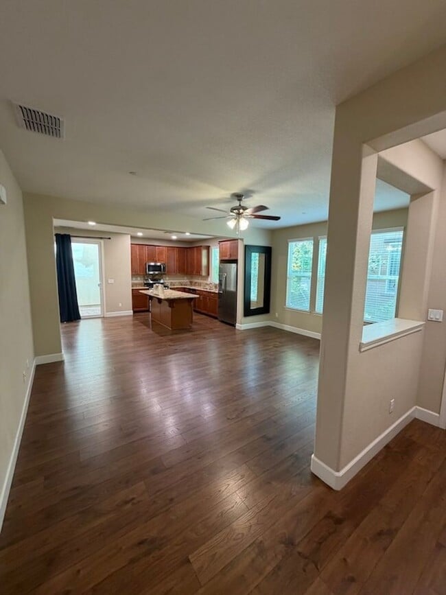 Building Photo - Solar Home with EV Garage Charging. 4 Bedroom Home with Downstairs Bedroom and Full Bathroom.