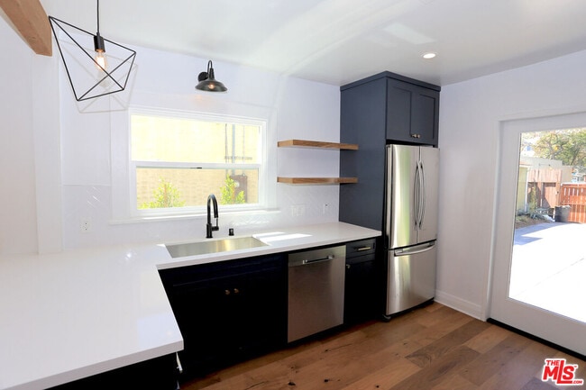 Building Photo - 3835 Hollypark Pl