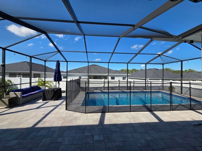 Building Photo - GORGEOUS 4-Bedroom, 3-Bathroom Pool Home, ...