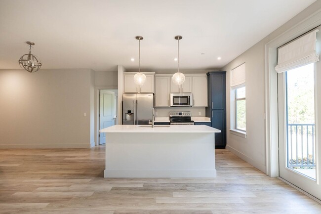 Building Photo - RARE 3 BEDROOM 2 BATH CONDO AT THE INLET -...