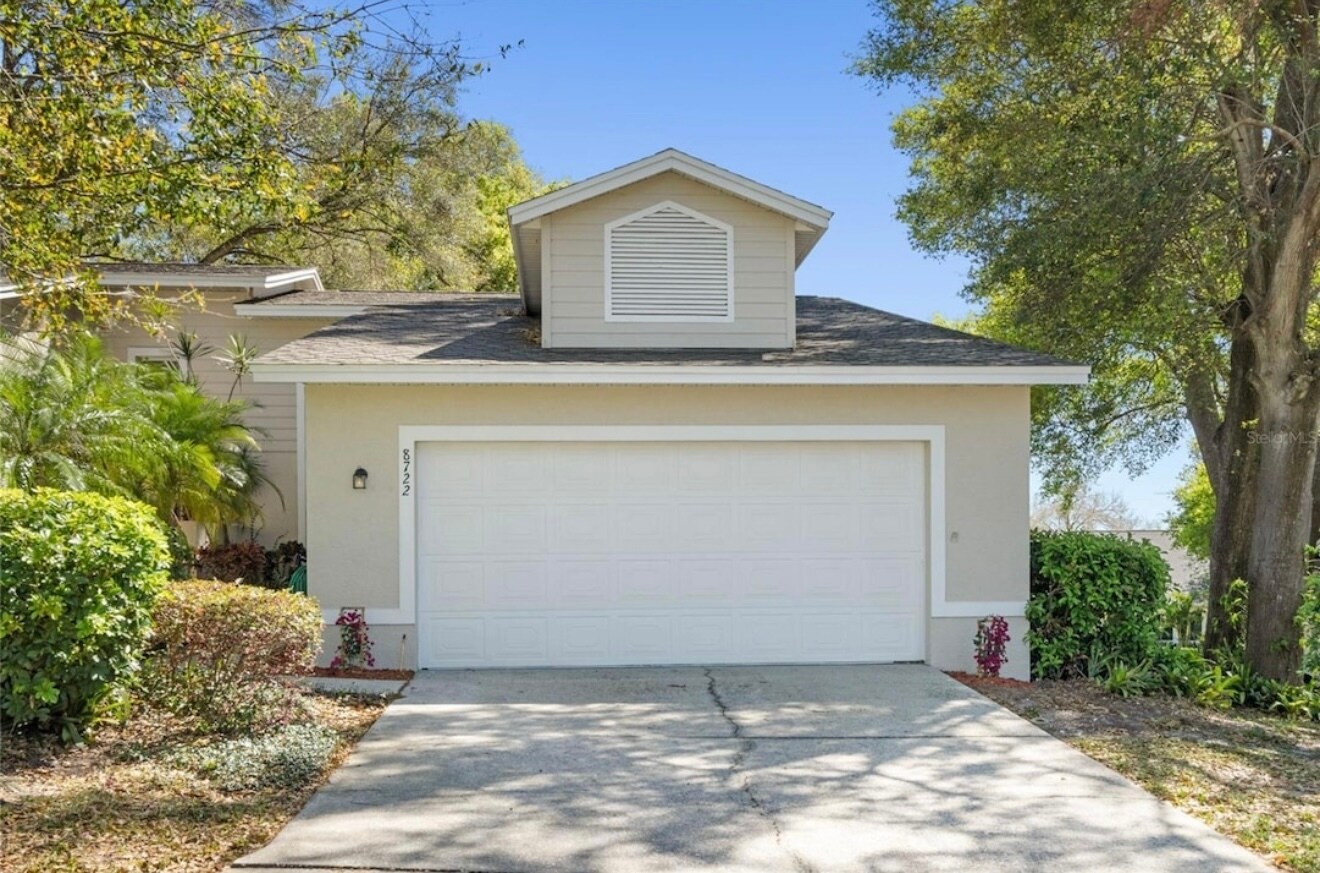Building Photo - 8722 Village Green Blvd