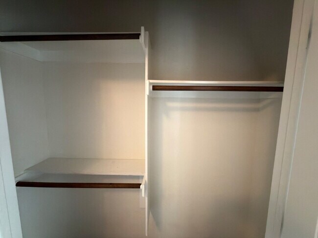 Building Photo - Four bed two bath on a corner lot with a pool in Sunfield. Gas cook top, double ovens. Open kitch...