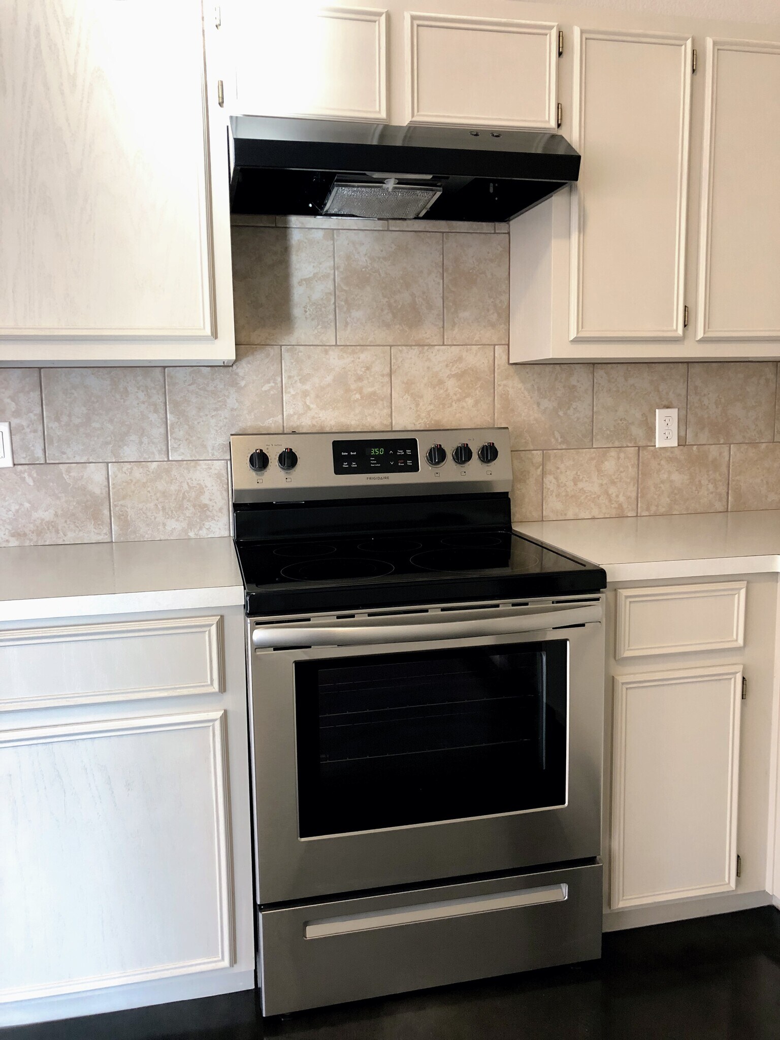 Over-the-range Microwave is not shown in this picture, but the unit does have it. - 128 E Ball Rd