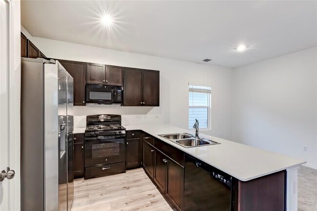 Building Photo - 7706 Poppy Petal Dr