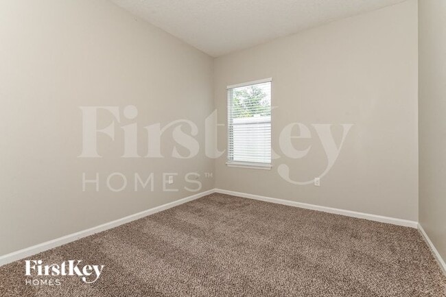 Building Photo - 8906 Devon Pines Dr