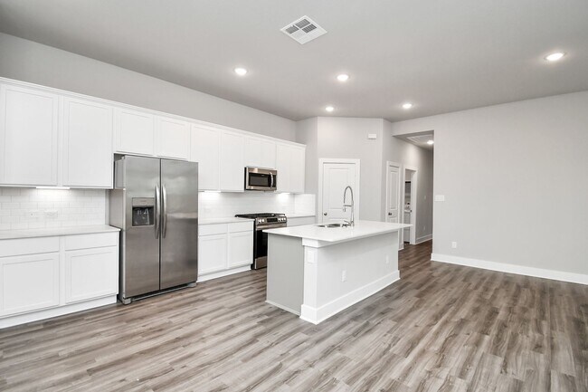 Building Photo - Welcome to the Elm — Single-Level Charm, Modern Style.