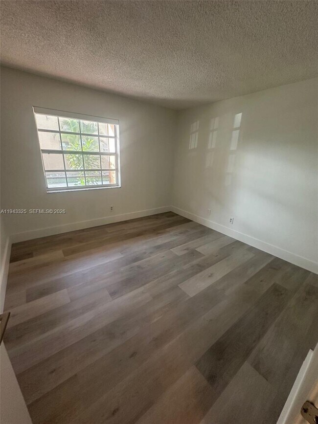 Building Photo - 10413 NW 7th St