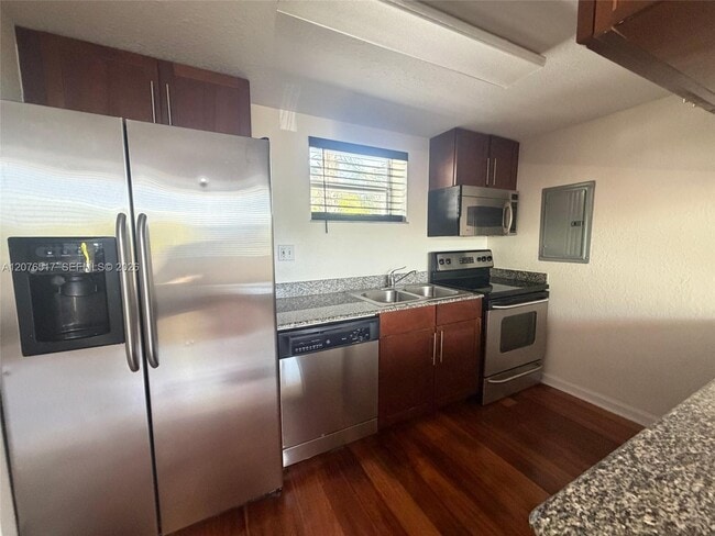 Building Photo - 8950 SW 69th Ct