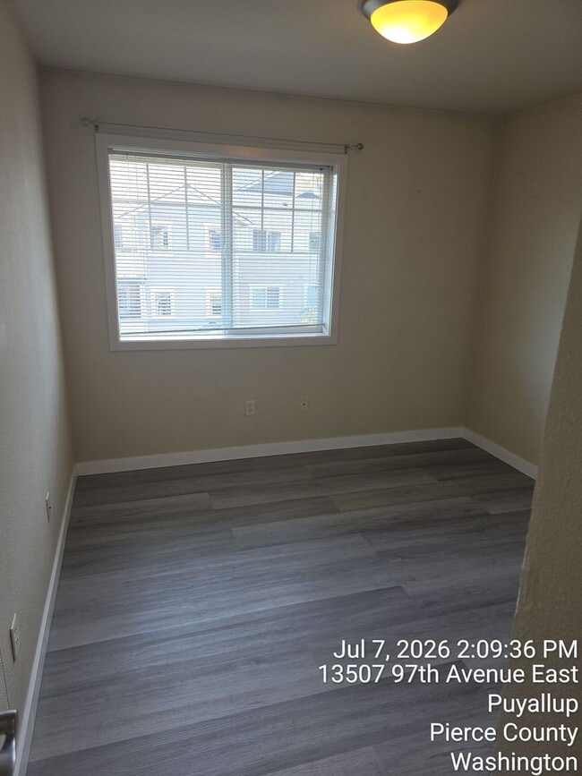 Building Photo - Trio Residences Puyallup condo - 2 bedroom, 2 bathroom with 2 car garage located in gated communi...