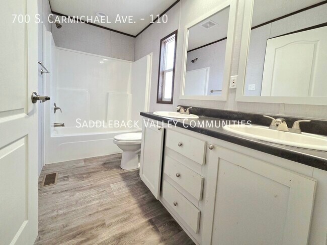 Building Photo - 700 S Carmichael Ave