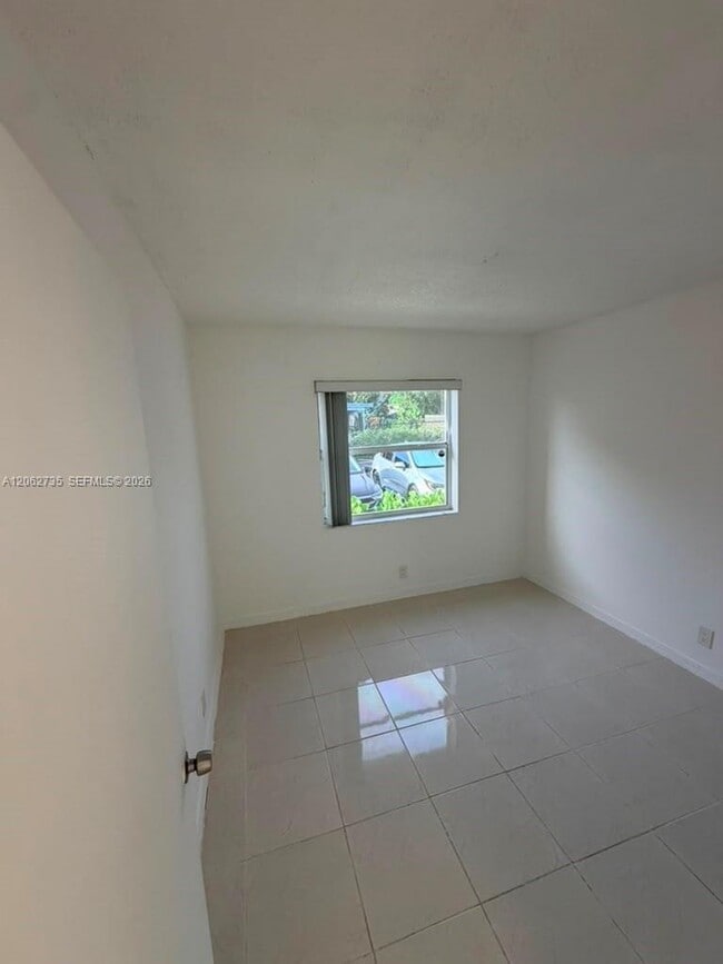 Building Photo - 12193 Royal Palm Blvd
