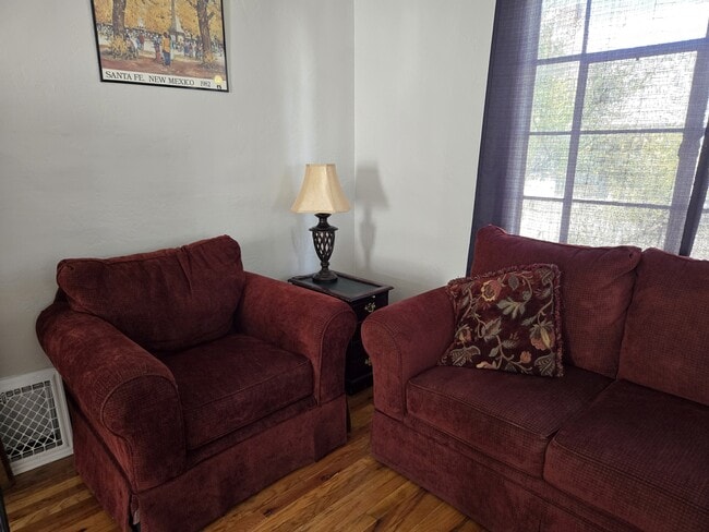 Living room with comfortable seating - 205 Harvard Dr SE