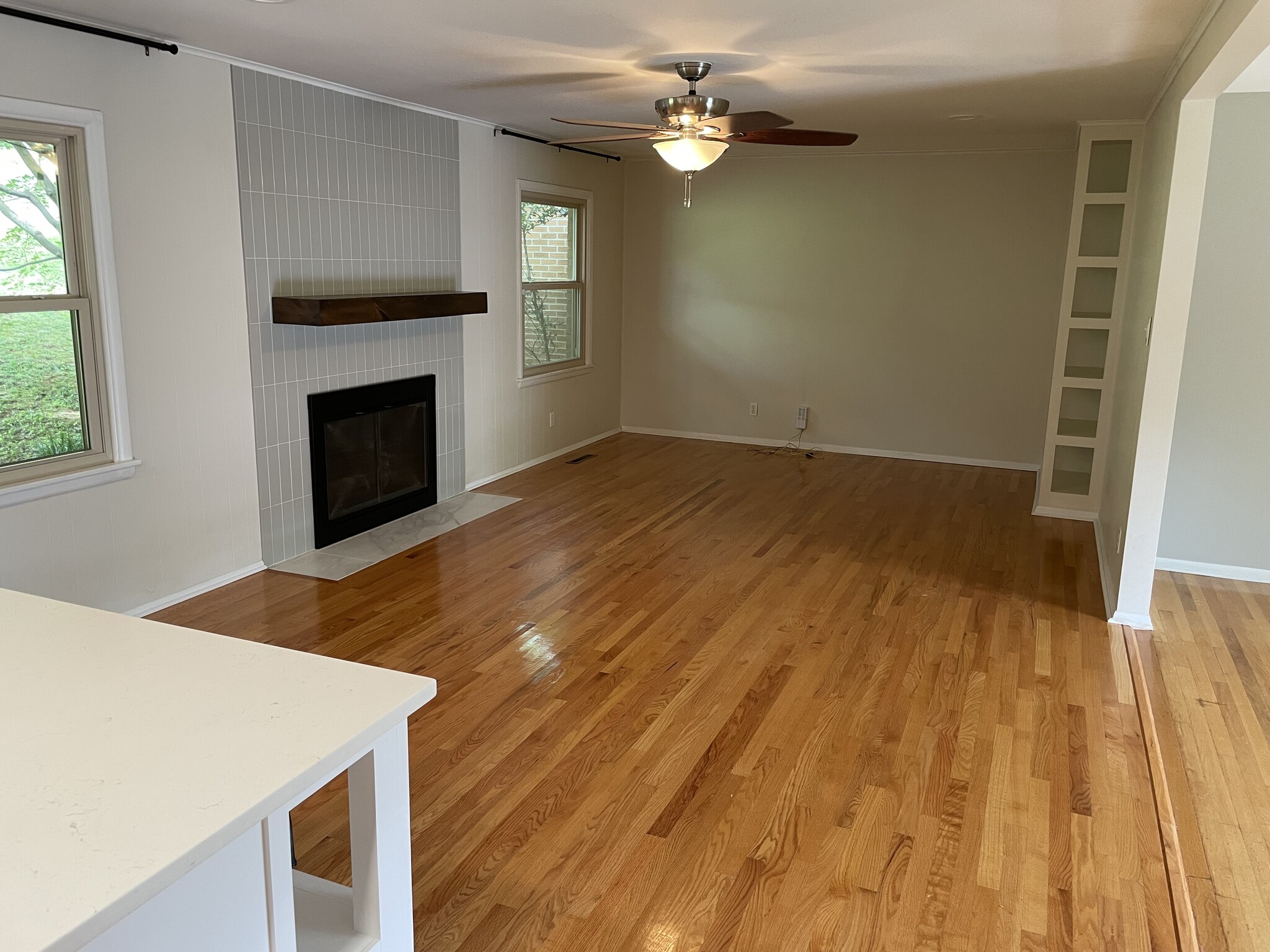 Open floor plan family room next to kitchen and living room w/plenty of natural light. - 8205 Ainsworth Dr
