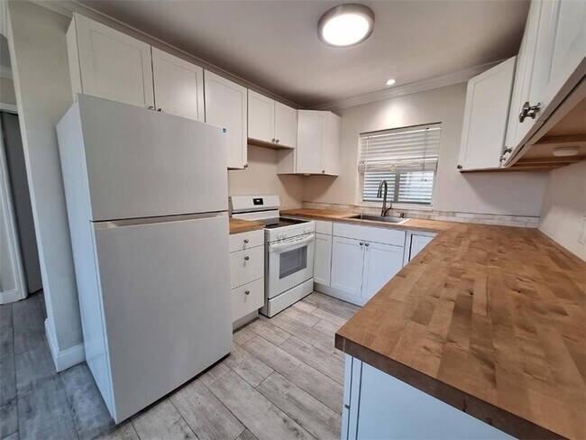 Building Photo - 9150 44th Ave