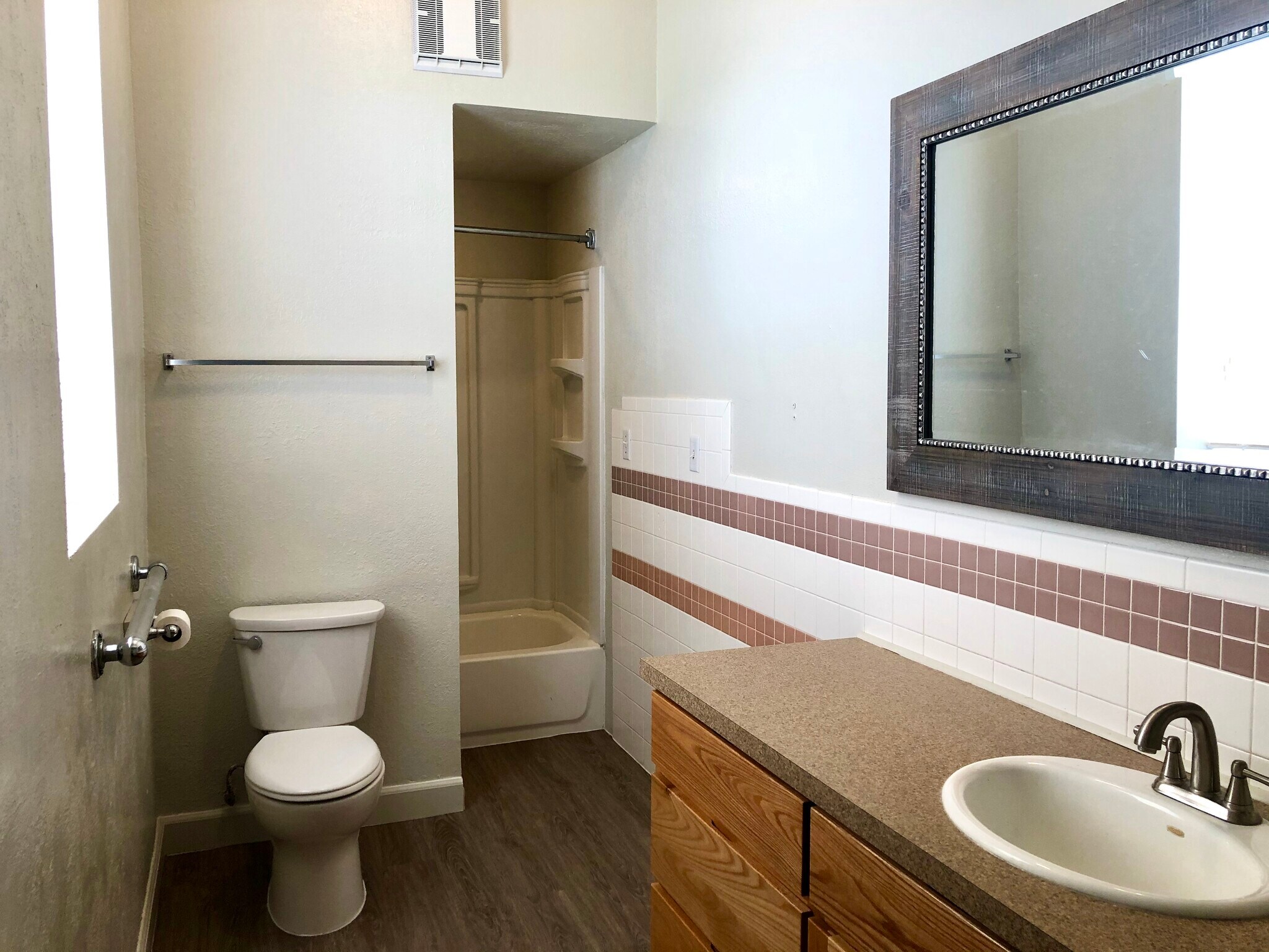Bathroom near kitchen and living room - 105 W 2nd St