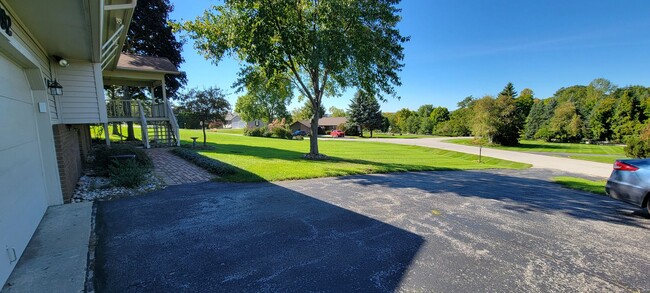 Building Photo - Beautiful home with peek a boo views of West Bay on Old Mission Peninsula