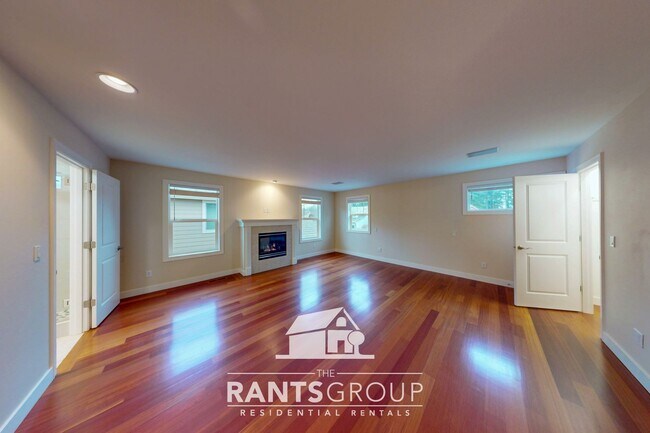 Building Photo - Meticulously Updated Townhome in Gated Community – Low Maintenance & Move-In Ready!