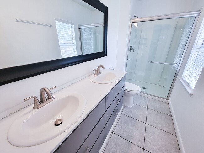 Building Photo - Welcome home to a bright & spacious retreat in sought-after Steeplechase where comfort, function ...